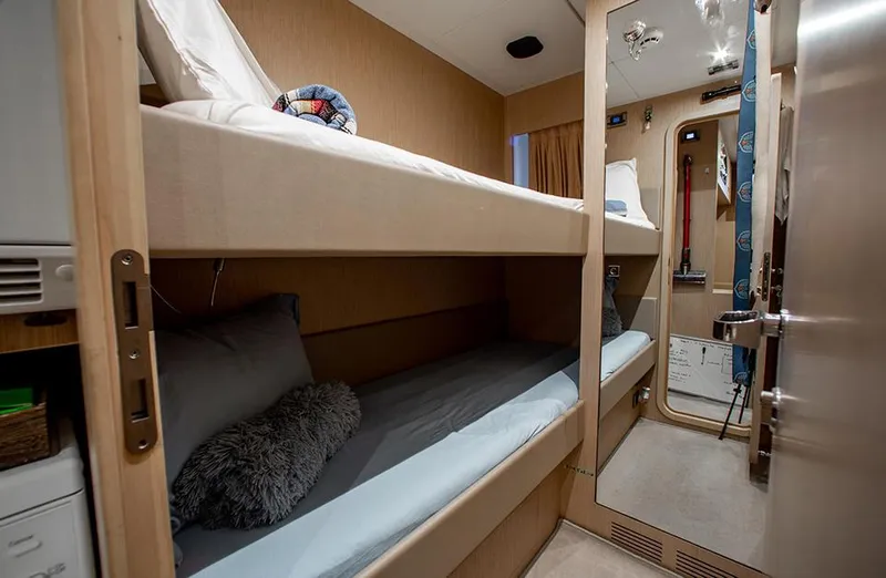 Slide: The Image of Bunk beds in the 2017 Riva 88 Domino Super yacht cabin. - 48