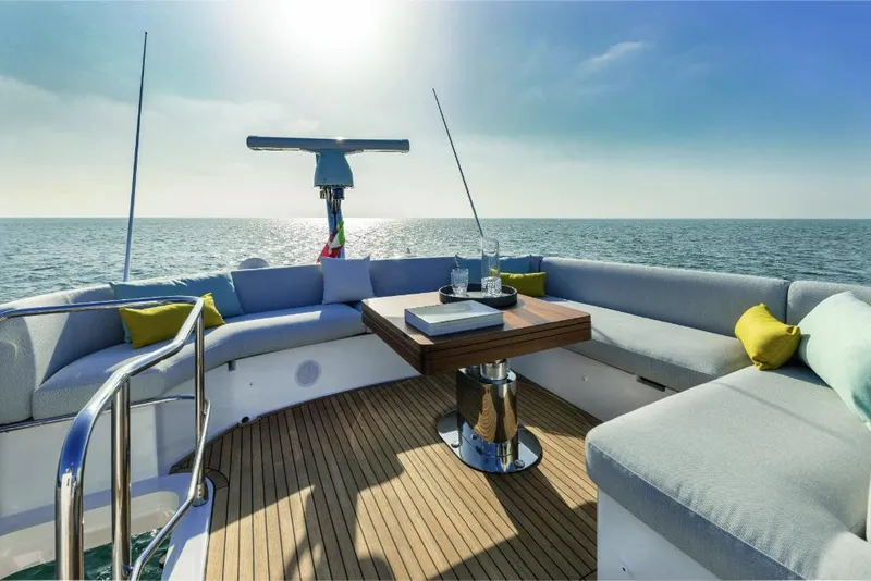 Slide: The Image of Luxurious seating area on the 2023 Azimut 53 yacht with ocean view. - 14