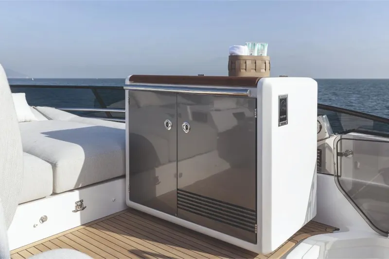 Slide: The Image of Outdoor seating and storage on 2023 Azimut 53 yacht, with ocean view. - 17
