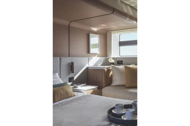 Slide: The Image of Luxurious interior of 2023 Azimut 53 yacht with cozy seating and modern decor. - 27