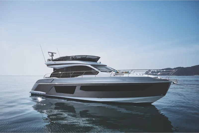 Slide: The Image of 2023 Azimut 53 yacht on calm waters. - 3