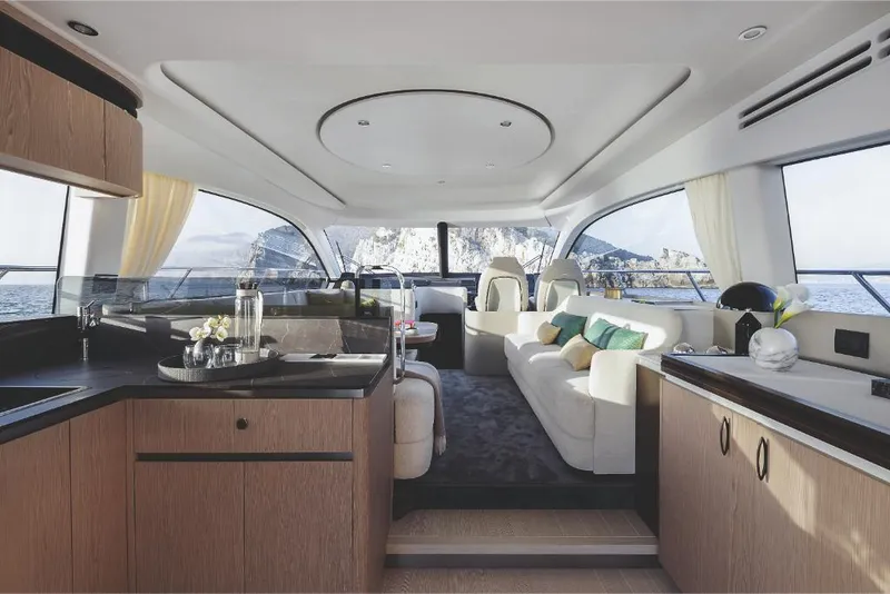 Slide: The Image of Luxurious interior of 2023 Azimut 53 yacht with modern furnishings and panoramic windows. - 30