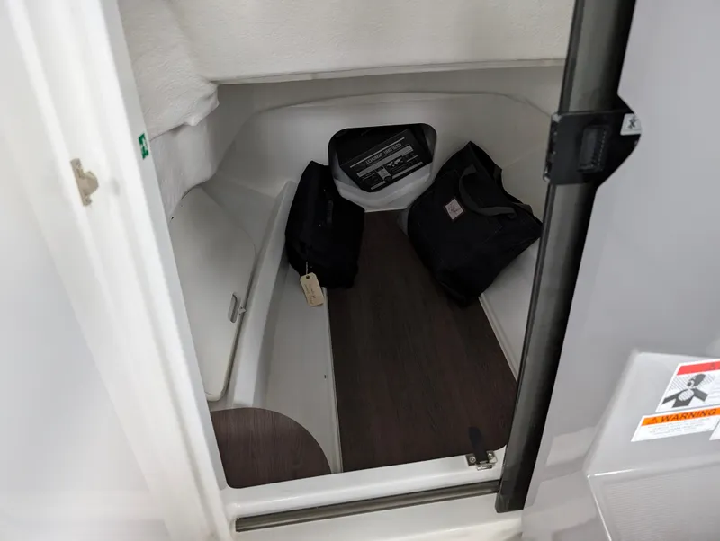 Slide: The Image of Interior cabin of 2023 Jeanneau Leader 6.5 S3 CC boat, featuring storage space. - 8