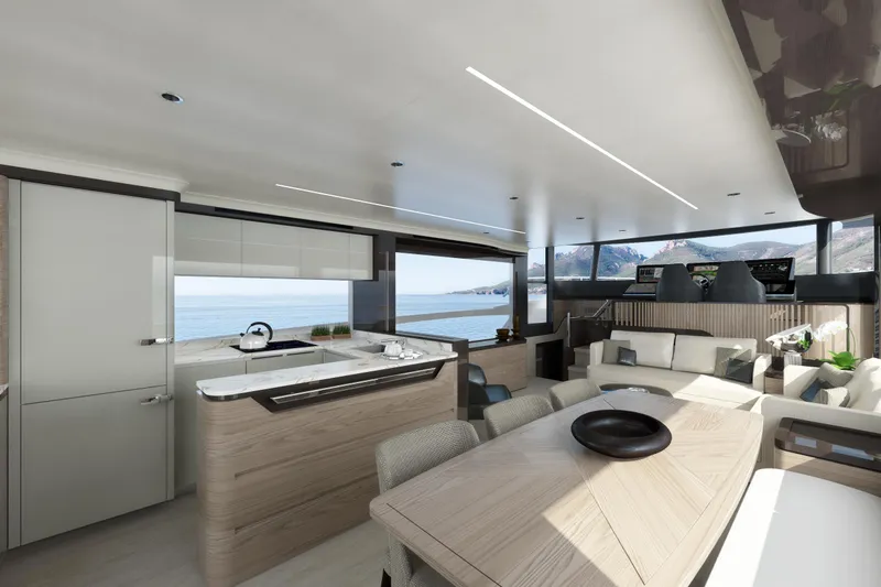 Slide: The Image of Luxurious interior of the 2025 Absolute Navetta 64 yacht with modern kitchen and seating area. - 13