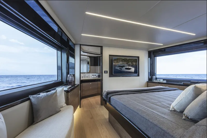 Slide: The Image of Luxurious interior of 2025 Absolute Navetta 64 yacht with ocean view. - 17