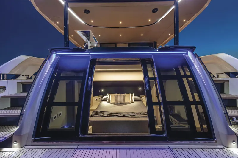 Slide: The Image of Luxurious 2025 Absolute Navetta 64 yacht interior with elegant bedroom view. - 4