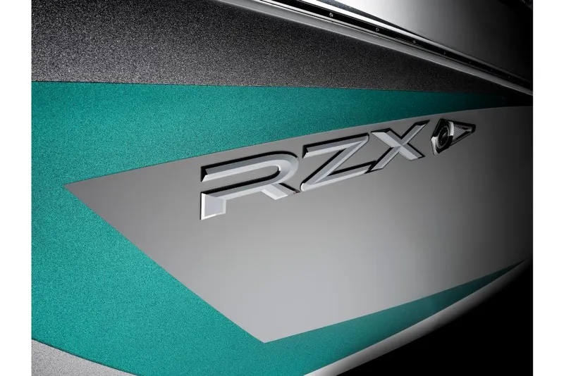 Slide: The Image of 2023 Tigé 24RZX boat model close-up with teal and gray design. - 11