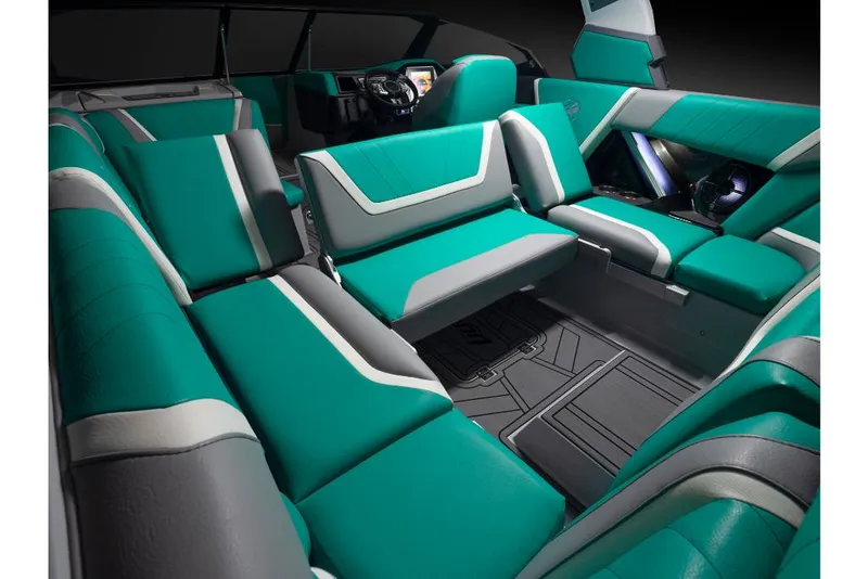 Slide: The Image of 2023 Tigé 24RZX boat interior with teal and gray seating. - 19