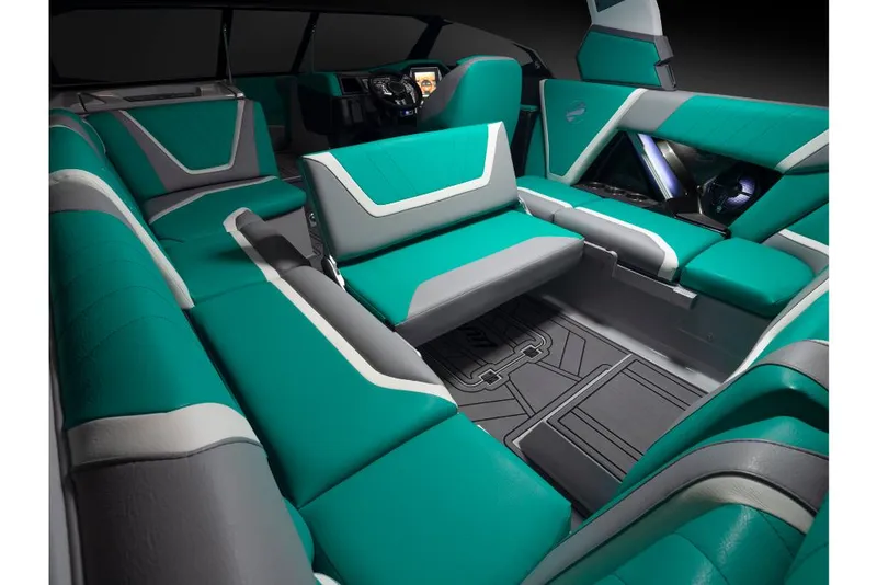 Slide: The Image of 2023 Tigé 24RZX boat interior with teal and gray seating. - 20
