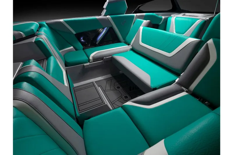 Slide: The Image of 2023 Tigé 24RZX boat interior with teal and white seating. - 21