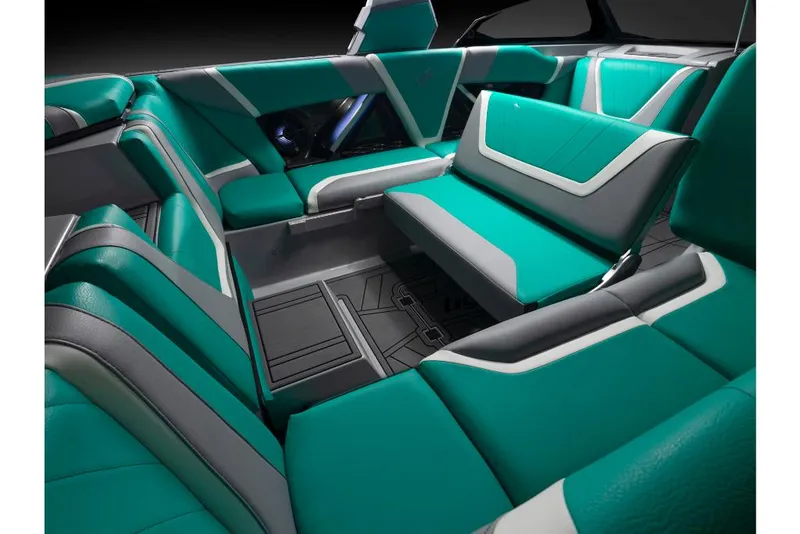 Slide: The Image of 2023 Tigé 24RZX boat interior with teal and gray seating. - 22