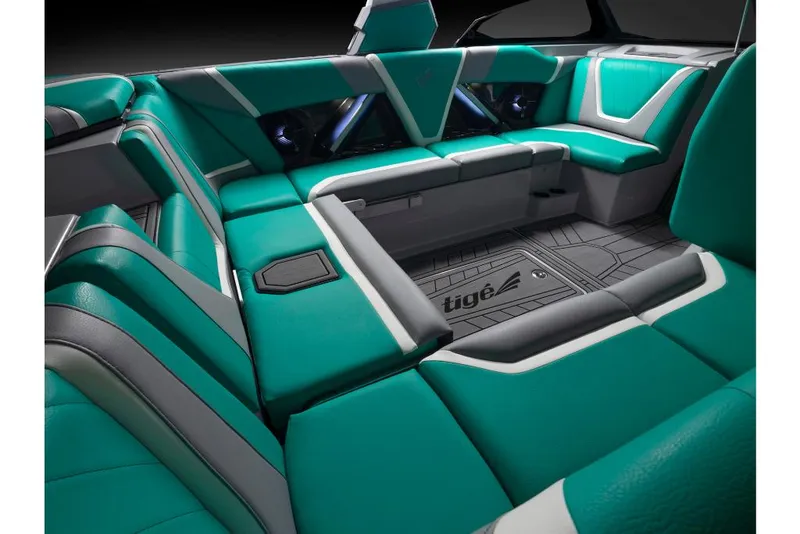 Slide: The Image of 2023 Tigé 24RZX boat interior with teal and gray seating. - 23