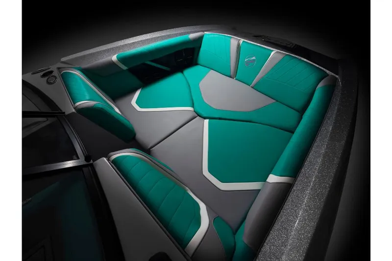 Slide: The Image of 2023 Tigé 24RZX boat interior with teal and gray seating. - 6