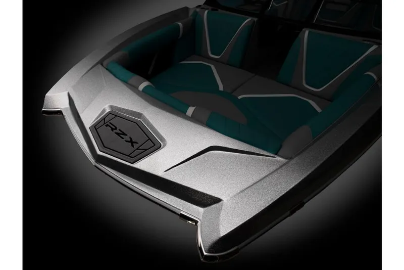 Slide: The Image of 2023 Tigé 24RZX boat bow with teal and gray seating. - 7