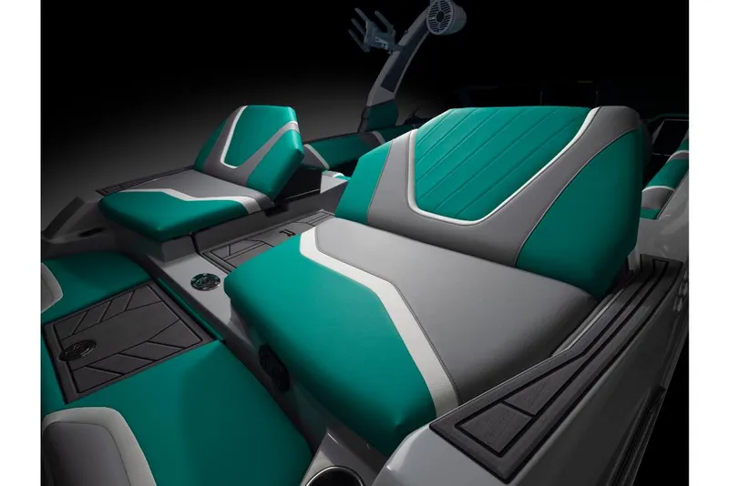 Slide: The Image of 2023 Tigé 24RZX boat interior with teal and gray seating. - 8
