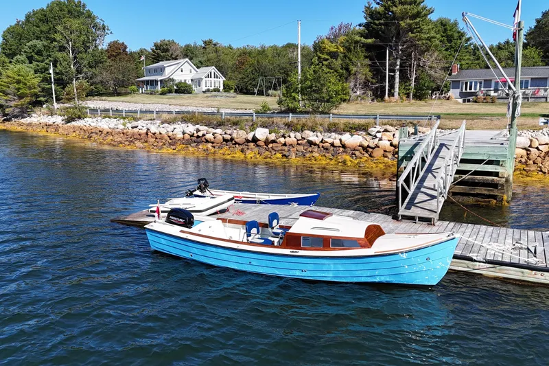 Slide: The Image of Custom Ninigret 22 OB Skiff 2025 - 2