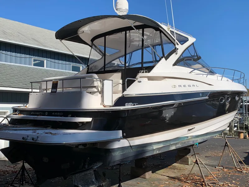 Slide: The Image of 2009 Regal 4460 yacht on dry dock for maintenance. - 3