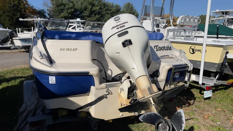 Slide: The Image of 2003 Glastron GX 180 Ski & Fish boat with Johnson outboard motor. - 14