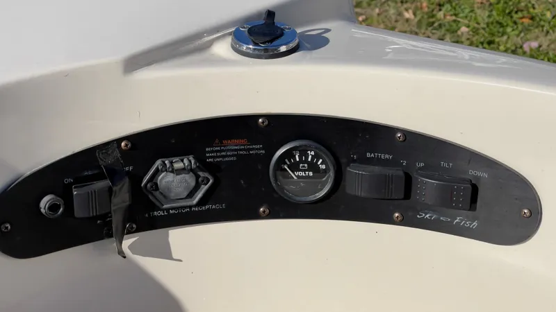 Slide: The Image of Control panel of a 2003 Glastron GX 180 Ski & Fish boat. - 19