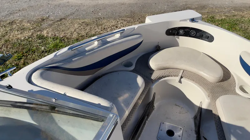 Slide: The Image of 2003 Glastron GX 180 Ski & Fish boat interior with seating and control panel. - 20