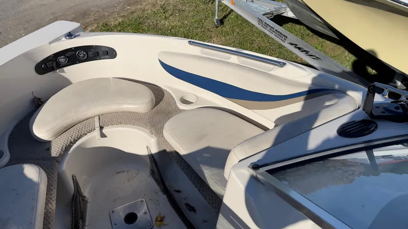 Slide: The Image of 2003 Glastron GX 180 Ski & Fish boat interior with seating and control panel. - 21