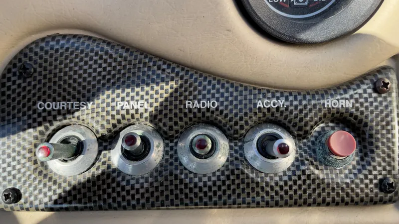 Slide: The Image of Control panel of a 2003 Glastron GX 180 Ski & Fish boat. - 23