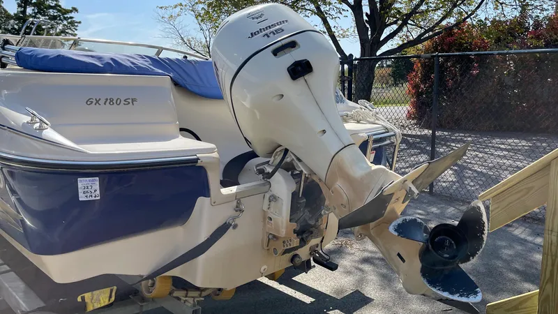 Slide: The Image of 2003 Glastron GX 180 Ski & Fish boat with Johnson outboard motor. - 32