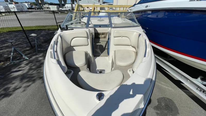 Slide: The Image of 2003 Glastron GX 180 Ski & Fish boat interior with seating and windshield. - 7