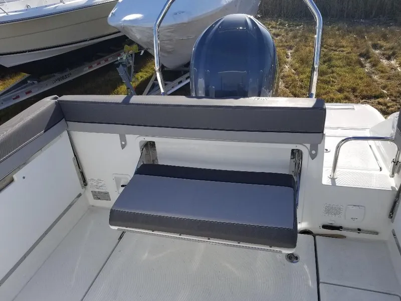 Slide: The Image of 2022 Jeanneau Leader 7.5 WA S3 boat with foldable rear seating. - 11