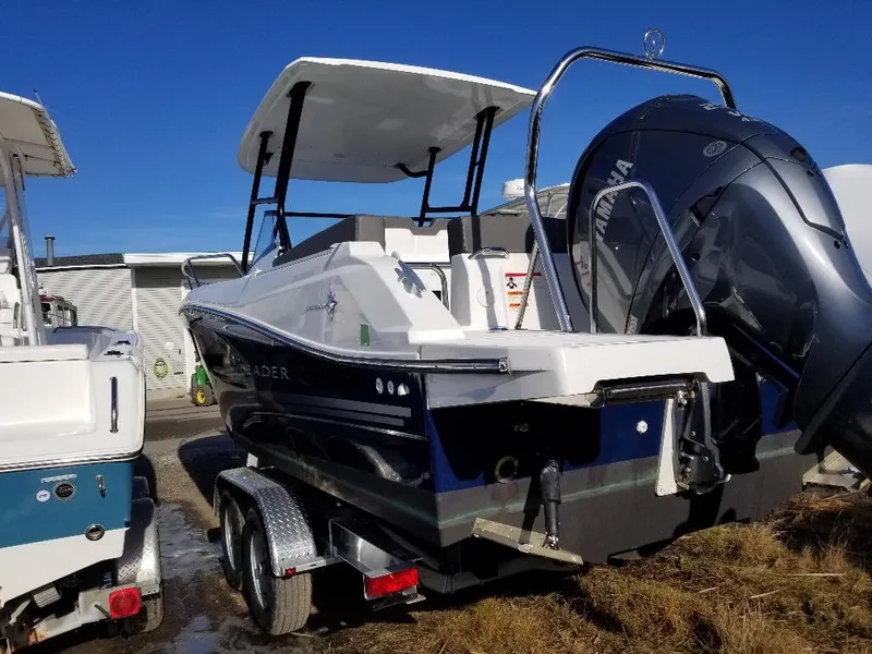 Slide: The Image of 2022 Jeanneau Leader 7.5 WA S3 boat on trailer, rear view, sunny day. - 17