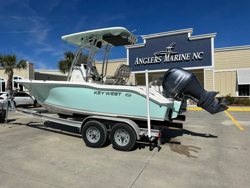 Slide: The Image of 2024 Key West 219 FS boat on trailer at Anglers Marine NC. - 1