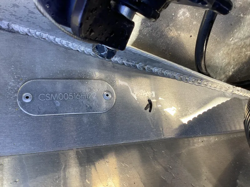 Slide: The Image of 2022 Crest CARIBBEAN LX 250 L boat hull identification number (HIN) plate. - 35