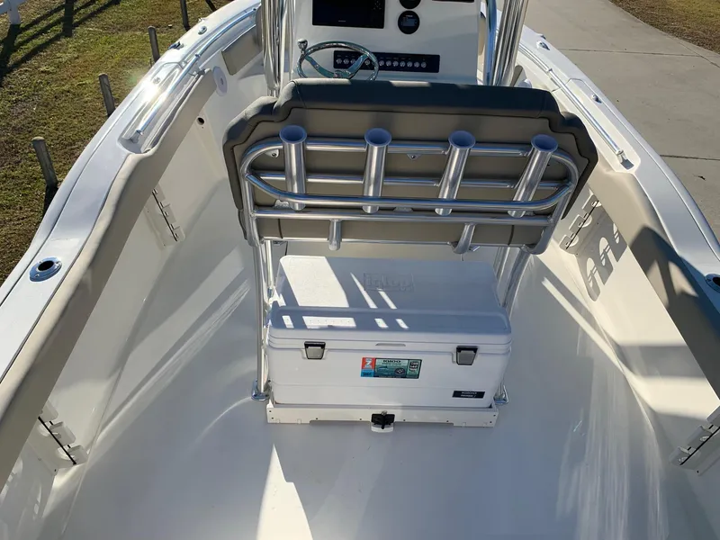 Slide: The Image of 2024 Key West 219 FS boat interior with seating and storage. - 11
