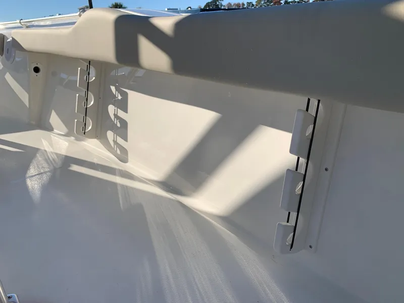 Slide: The Image of 2024 Key West 219 FS boat interior with rod holders. - 9