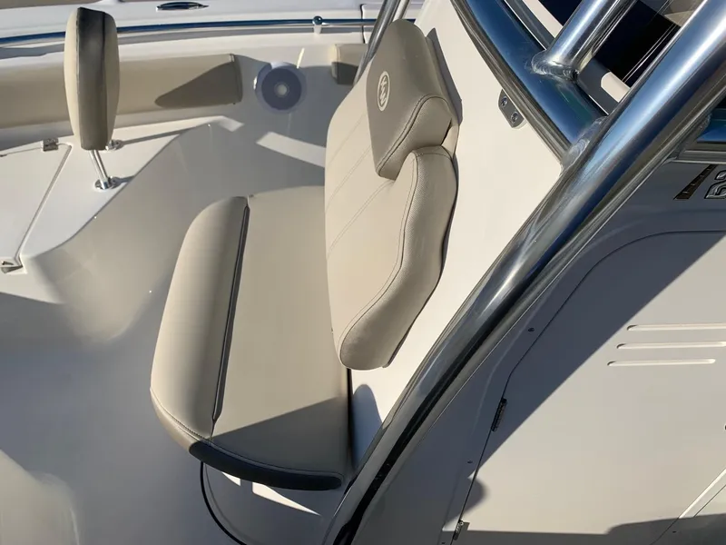 Slide: The Image of 2024 Key West 219 FS boat interior seating and console. - 17