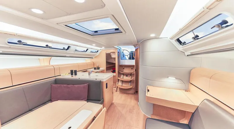 Slide: The Image of Interior of 2025 Dehler 38 SQ yacht with modern design and ample natural light. - 17
