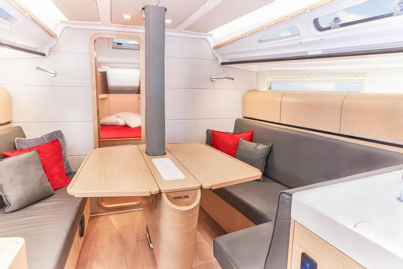 Slide: The Image of Modern interior of 2025 Dehler 38 SQ yacht with cozy seating and dining area. - 19