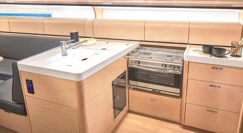 Slide: The Image of Modern kitchen interior of 2025 Dehler 38 SQ yacht with stove and sink. - 23