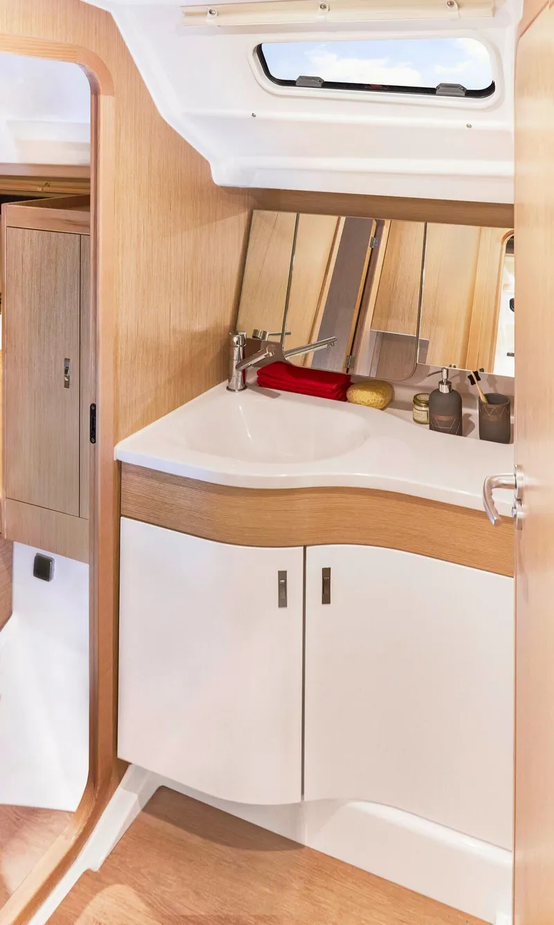 Slide: The Image of Modern bathroom interior of 2025 Dehler 38 SQ yacht with wooden accents. - 26