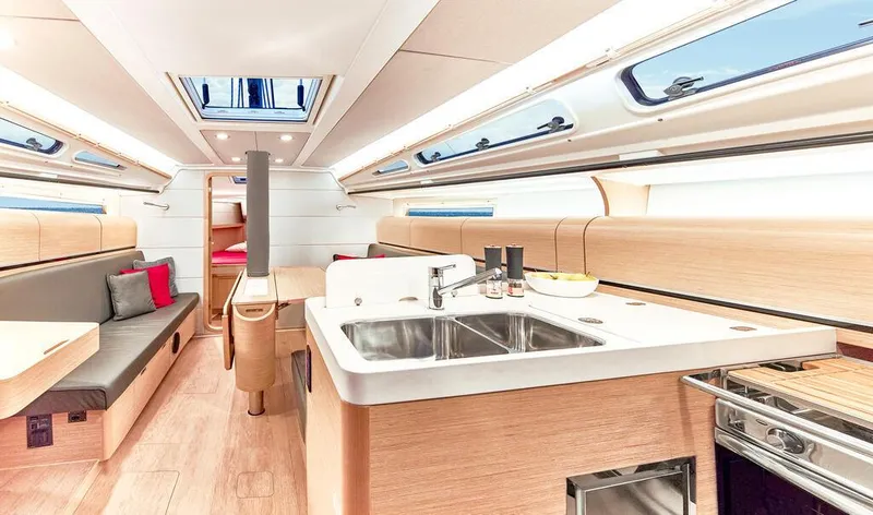 Slide: The Image of Dehler 38 SQ 2025 yacht interior with built-in bottle storage drawer. - 19