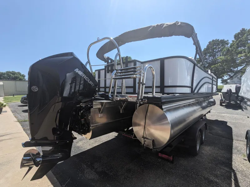 Slide: The Image of 2023 Harris Cruiser 230 Fish & Cruise pontoon boat with Mercury outboard motor. - 3