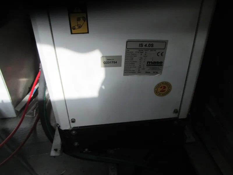 Slide: The Image of Generator unit in a 2000 Mainship 30 PILOT boat. - 24
