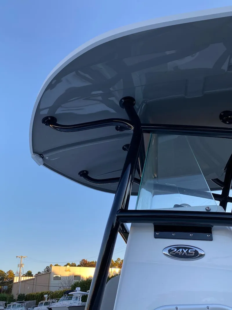 Slide: The Image of 2024 Cape Horn 24 XS boat with T-top and console. - 14