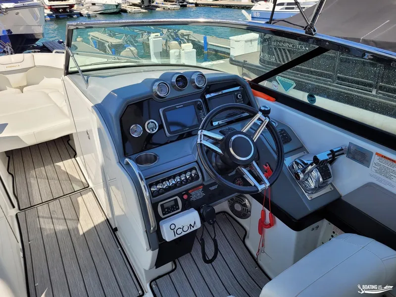 Slide: The Image of 2014 Formula 290 BR boat cockpit with steering wheel and control panel. - 20