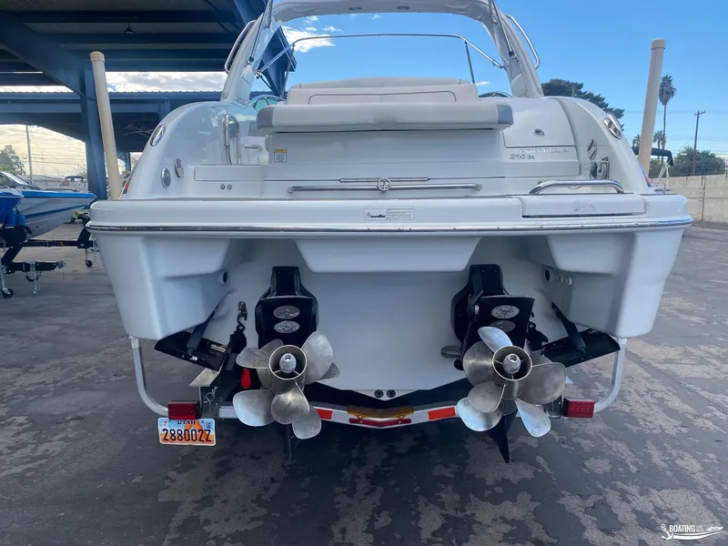 Slide: The Image of Rear view of a 2014 Formula 290 BR boat with dual propellers. - 30