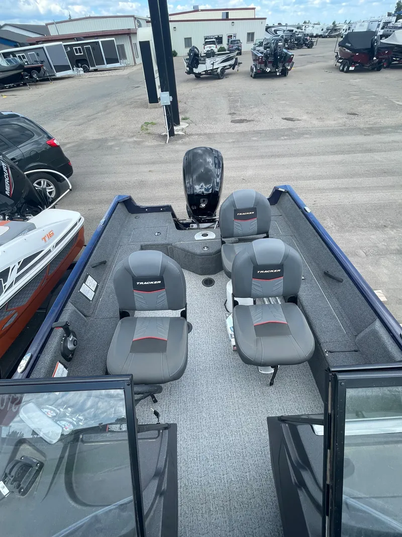 Slide: The Image of 2021 Tracker Pro Guide V-16 WT fishing boat interior with seating. - 11