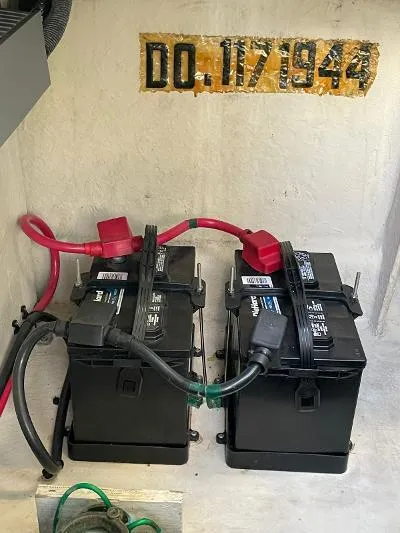Slide: The Image of Batteries in the engine compartment of a 2005 Sea Ray 340 Sundancer. - 17