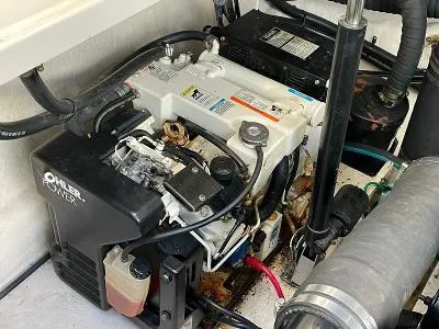 Slide: The Image of Engine compartment of a 2005 Sea Ray 340 Sundancer boat. - 18