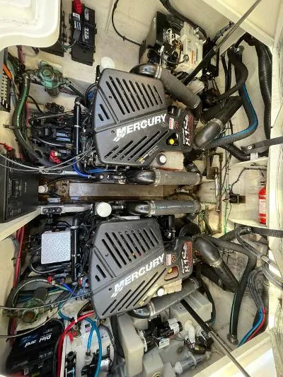 Slide: The Image of Engine room of a 2005 Sea Ray 340 Sundancer with Mercury engines. - 19