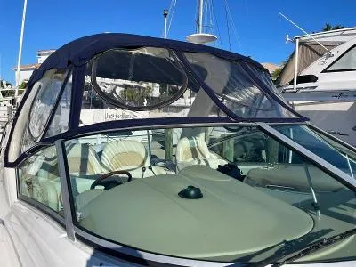 Slide: The Image of 2005 Sea Ray 340 Sundancer with canopy at the marina. - 22